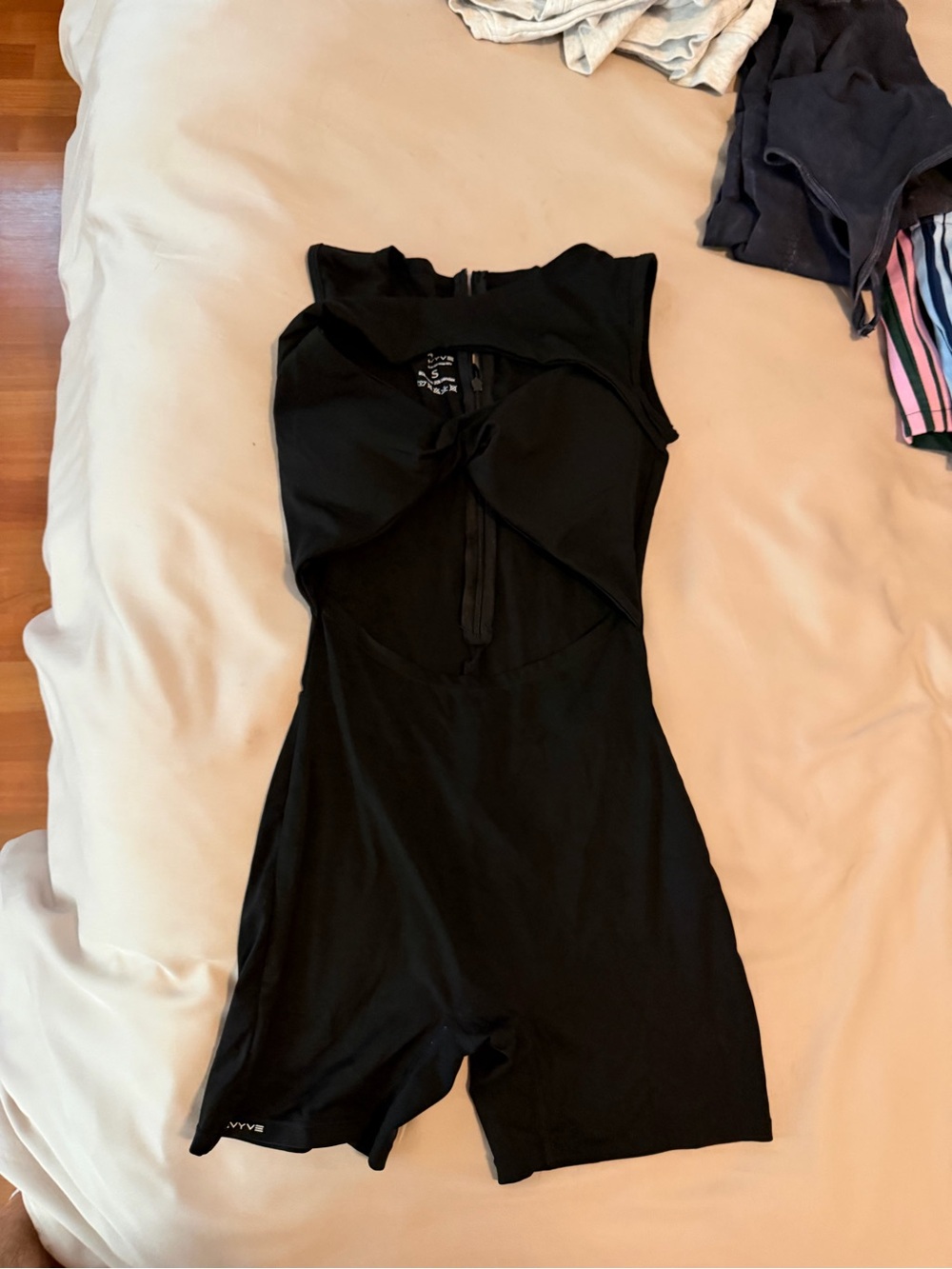 Black Sleeveless Romper Jumpsuit with Front Twist Detail